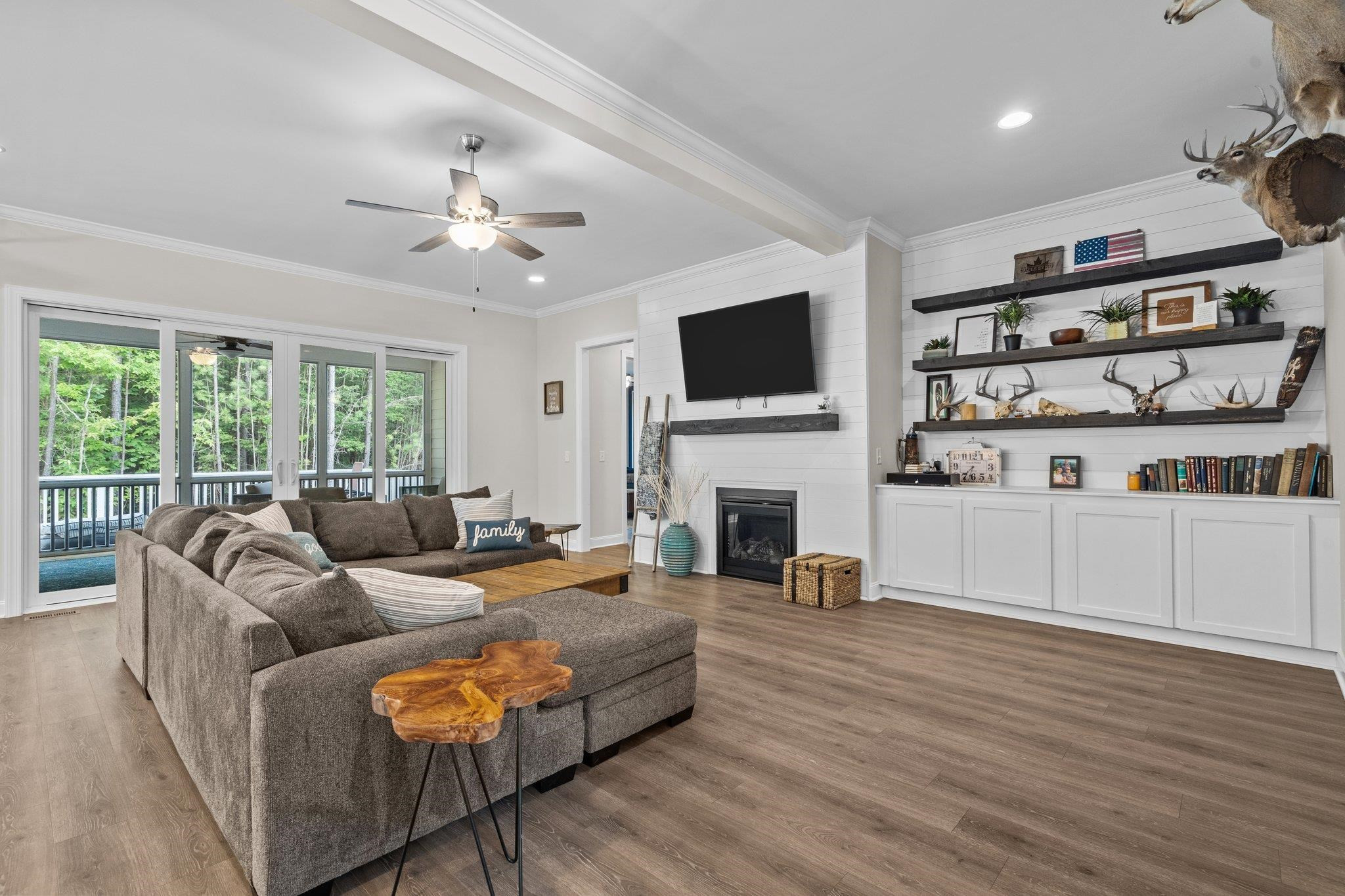 116 Brandy Mill Pittsboro, NC 27312 - Photo 10 of 47 a living room with furniture fireplace and flat screen tv