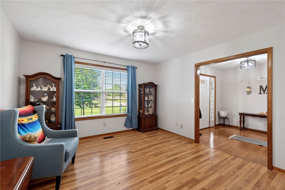 4996 Shannon Avenue Springfield, OH 45504 - Photo 5 of 61 This inviting space features lustrous wood flooring and abundant natural light.