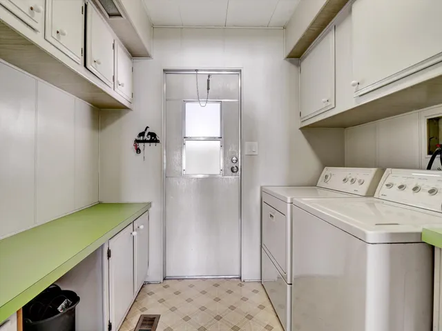 a view of a bathroom from a hallway