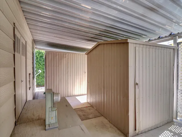 a view of a pathway with a yard