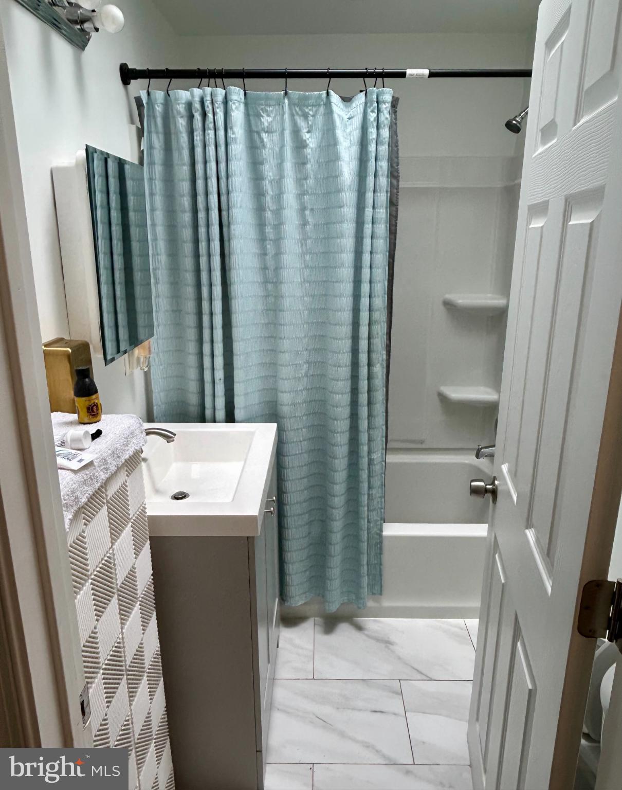 417 Copley Road Upper Darby, PA 19082 - Photo 11 of 14 a bathroom with a sink toilet and shower