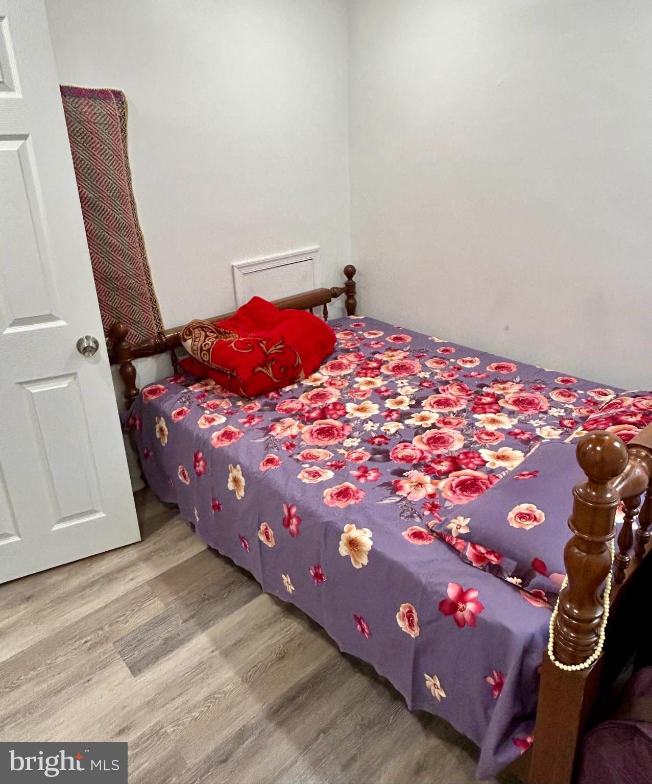 417 Copley Road Upper Darby, PA 19082 - Photo 12 of 14 a bedroom with a bed and a couch