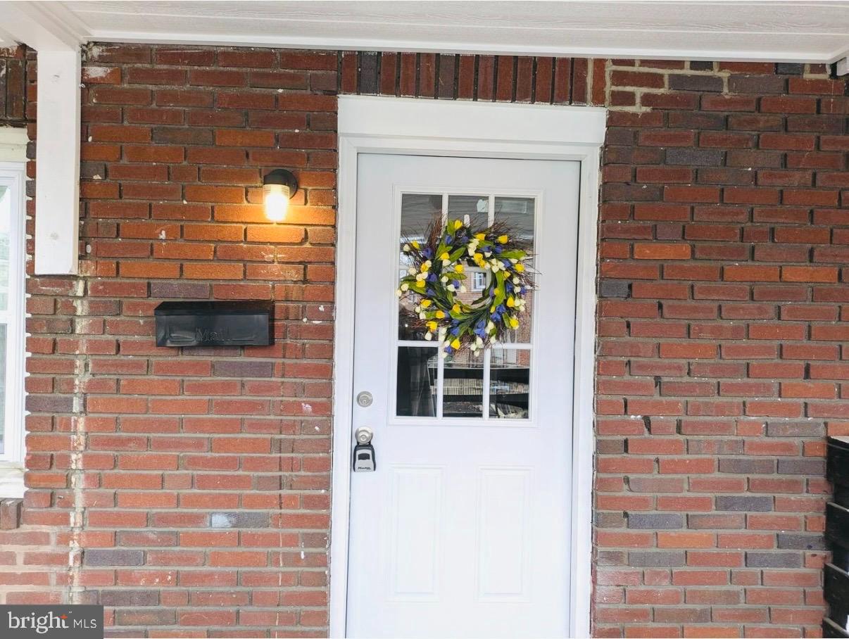 417 Copley Road Upper Darby, PA 19082 - Photo 2 of 13 Front door with covered front porch