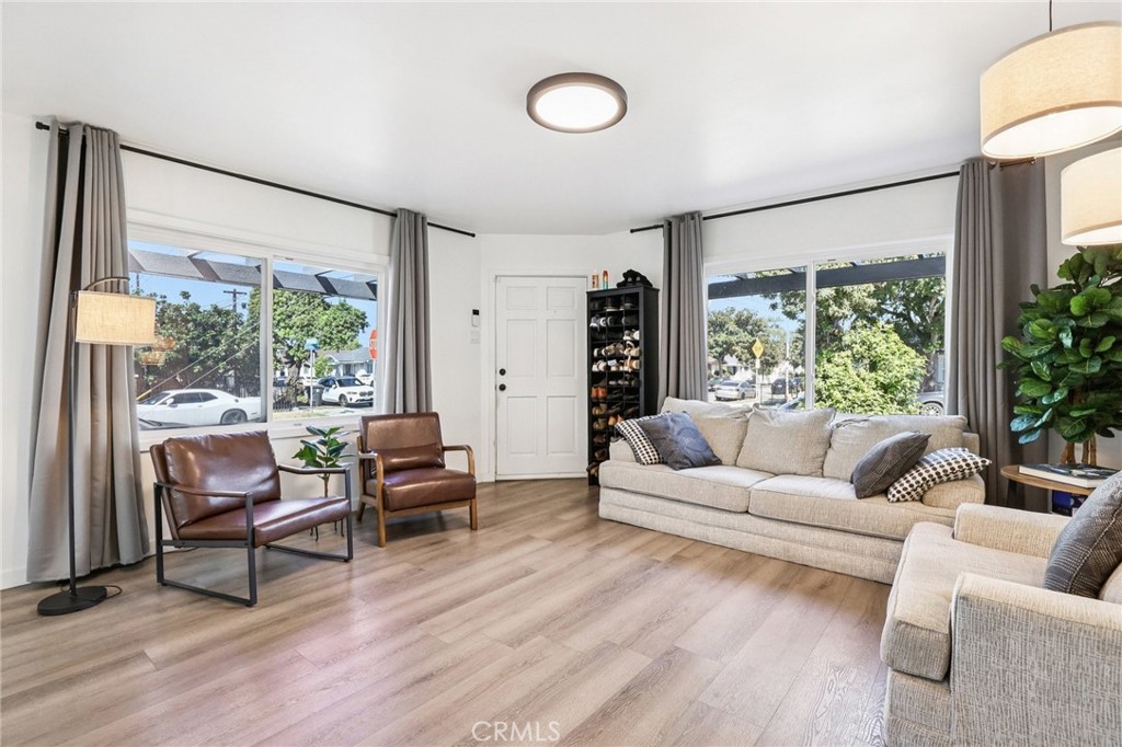 1448 Lemon Avenue Long Beach, CA 90813 - Photo 2 of 16 a living room with furniture and a large window