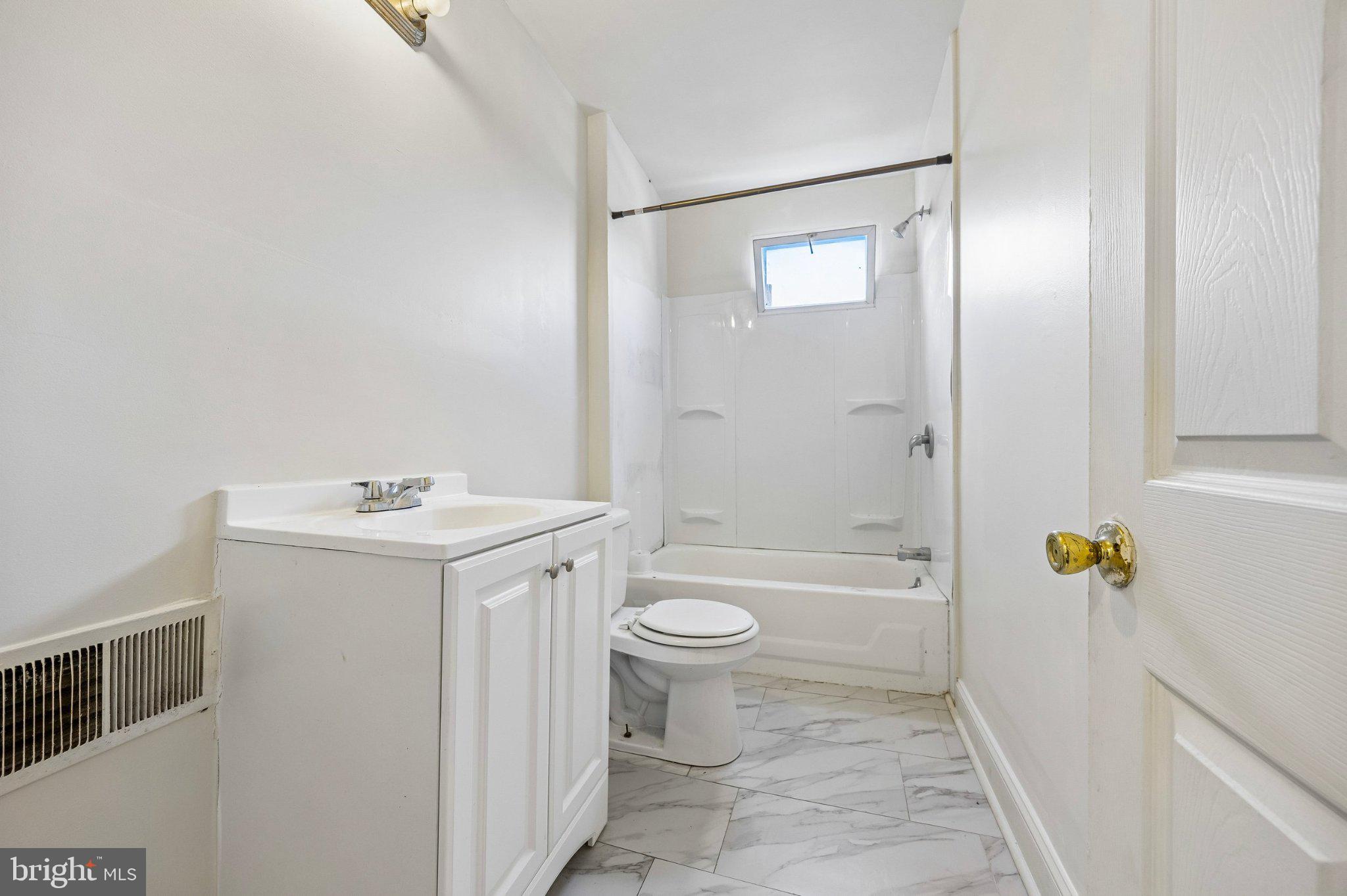2706 West 7th Street Chester, PA 19013 - Photo 13 of 15 Bright and airy bathroom retreat.