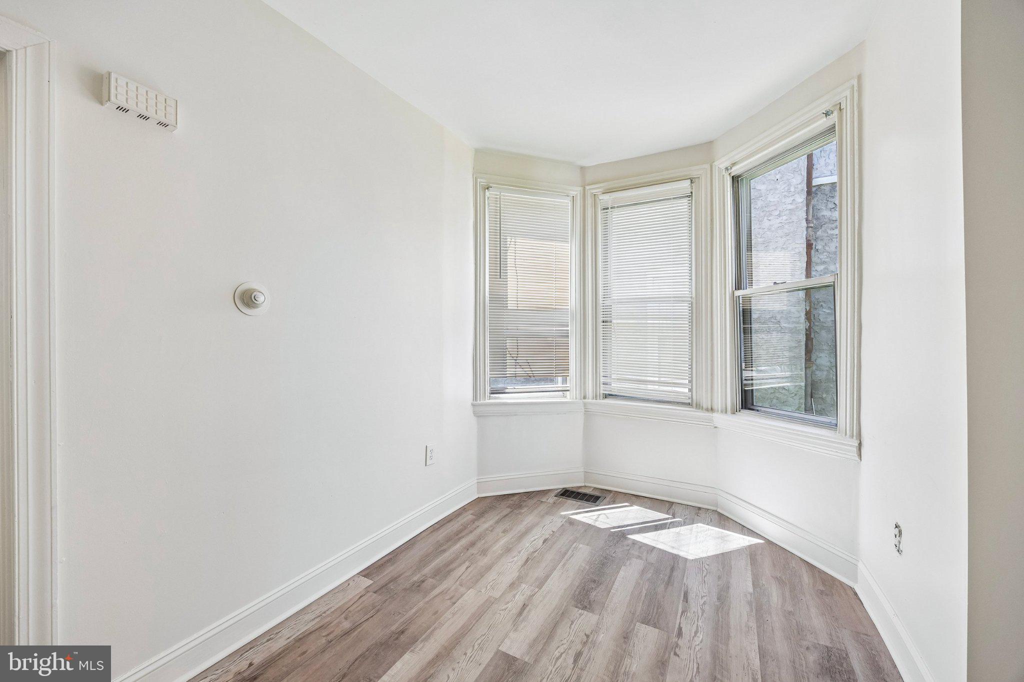 2706 West 7th Street Chester, PA 19013 - Photo 4 of 15 Bright corner nook with natural light.
