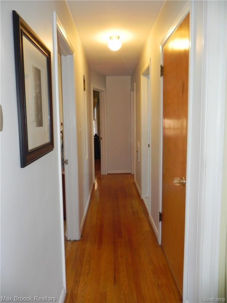 4021 Amherst Road Royal Oak, MI 48073 - Photo 13 of 34 WOOD FLOORS THROUGHOUT HALLWAY & BEDROOMS