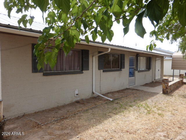 303 Greenwich Road Kearny, AZ 85137 - Photo 3 of 18 a view of a house with a tree in the background