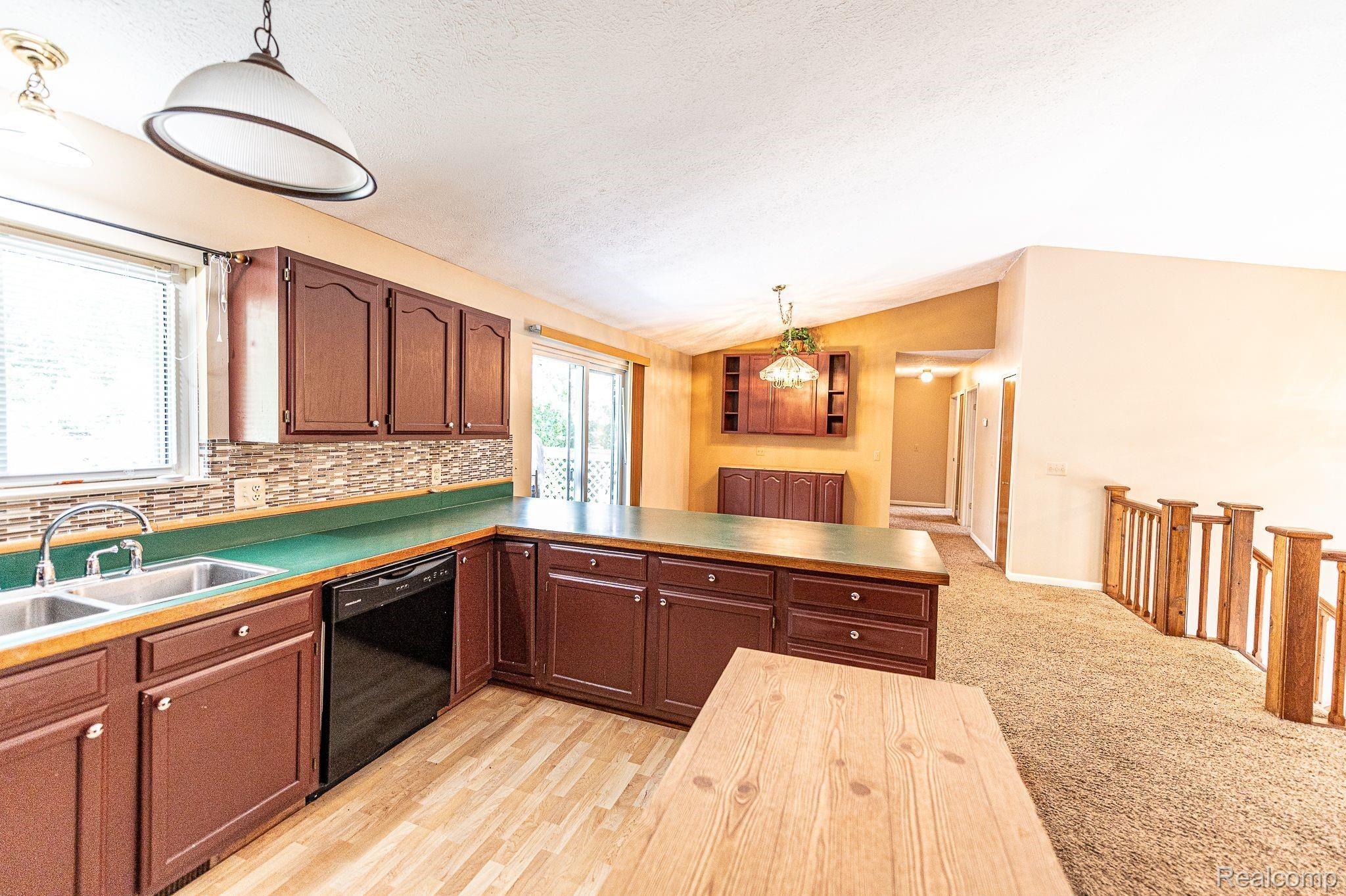 7881 Oak Grove Road Howell, MI 48855 - Photo 18 of 31 kitchen to dining room .jpeg