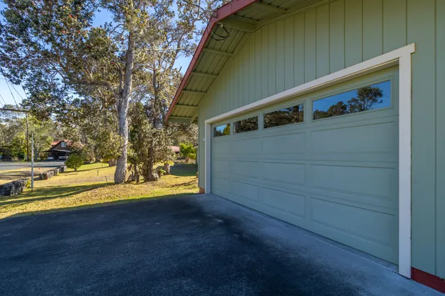 a view of a back yard of the house