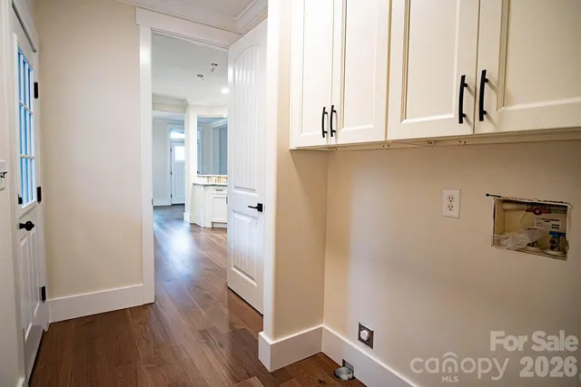 a bathroom with a white toilet and a shower