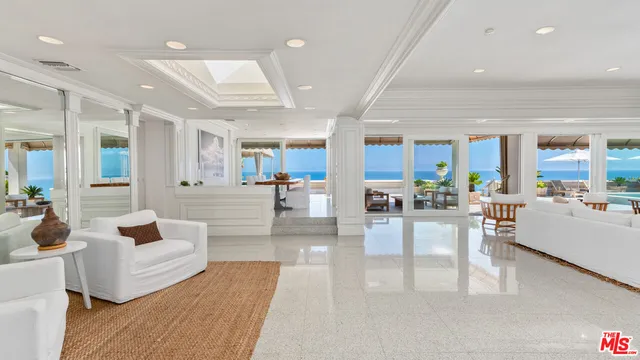 a kitchen with stainless steel appliances granite countertop a sink and a stove