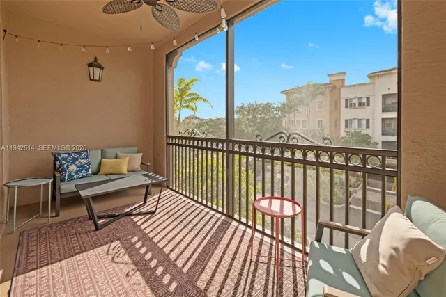 a view of a balcony with furniture