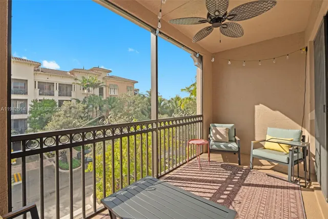 a view of a balcony with wooden floor