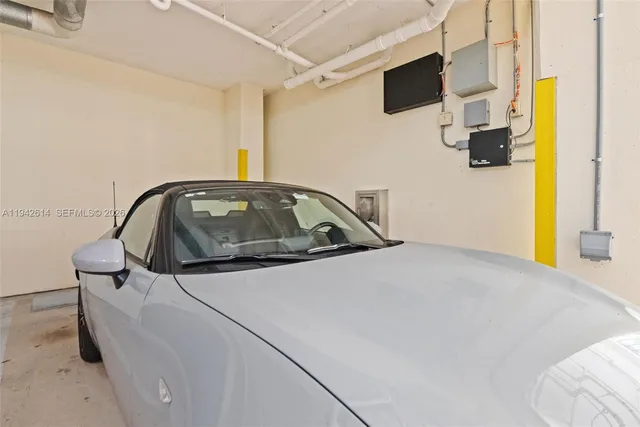 a car parked in front of a house