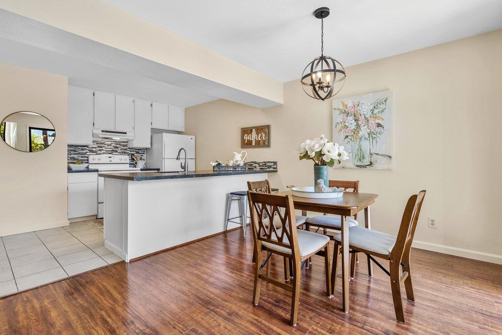 2747 Subec Lane Soquel, CA 95073 - Photo 4 of 34 a dining room filled chandelier and wooden floor
