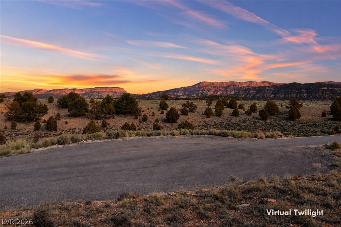 1825 Eagle Ridge Circle Hatch, UT 84735 - Photo 23 of 30 Unobstructed desert views greet a majestic mountain panorama at sunset, offering endless possibilities.