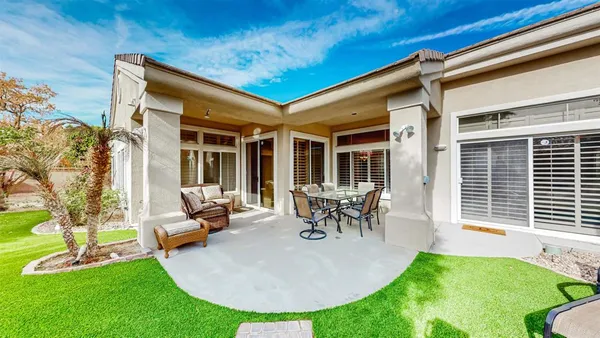 a view of yard with patio