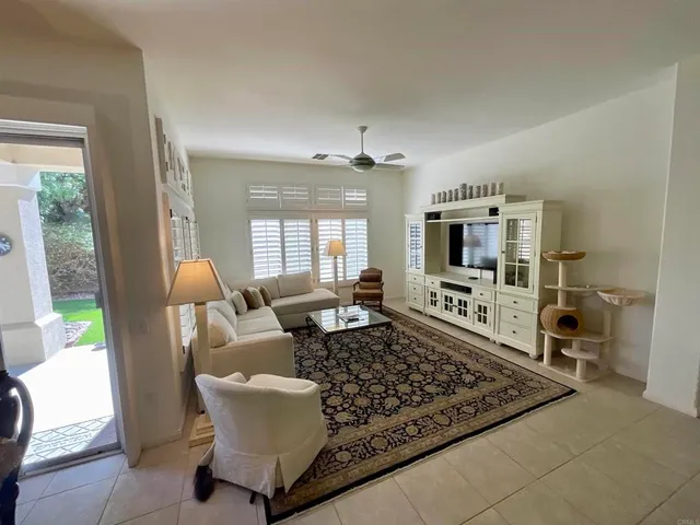 a bed room with a bed and a painting