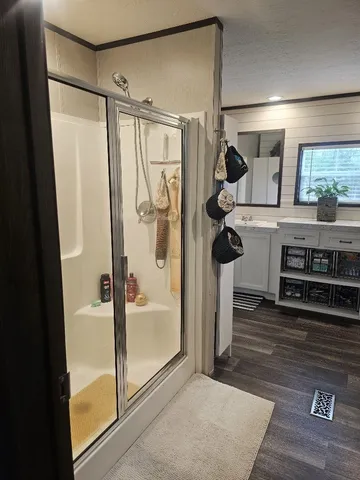 a bathroom with a bathtub and a shower