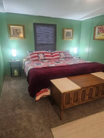 a outdoor space with furniture and a kitchen