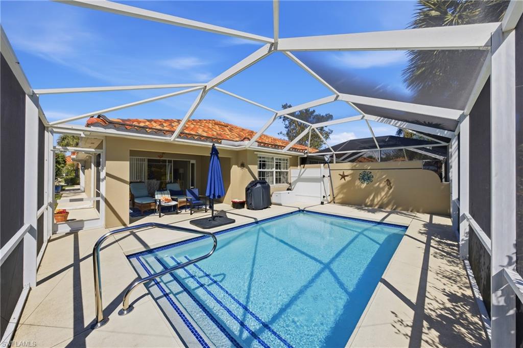 3614 El Segundo Court Naples, FL 34109 - Photo 2 of 49 a view of a room with chairs and balcony