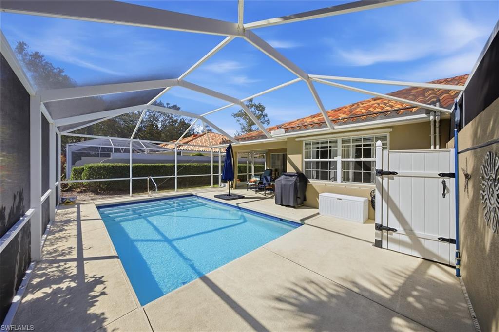 3614 El Segundo Court Naples, FL 34109 - Photo 26 of 49 a view of a house with wooden floor and roof with a potted plant