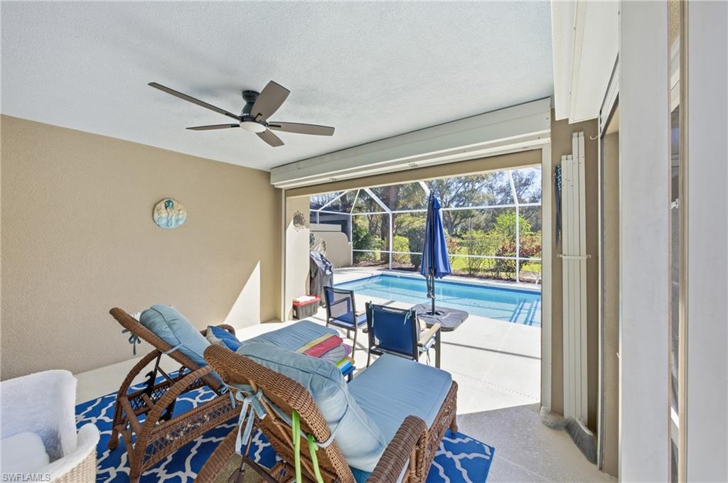 3614 El Segundo Court Naples, FL 34109 - Photo 3 of 49 a bed room with furniture and a window