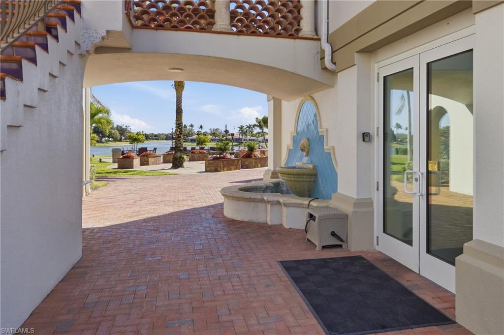 3614 El Segundo Court Naples, FL 34109 - Photo 34 of 49 a view of a living room and a porch