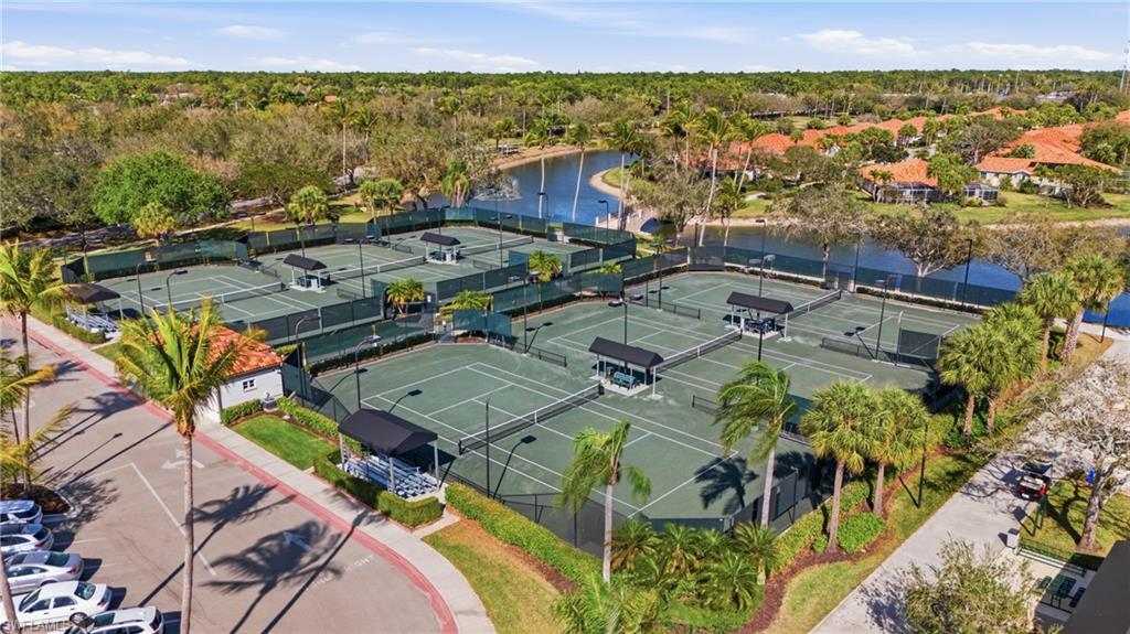 3614 El Segundo Court Naples, FL 34109 - Photo 43 of 49 an aerial view of a house with a lake view