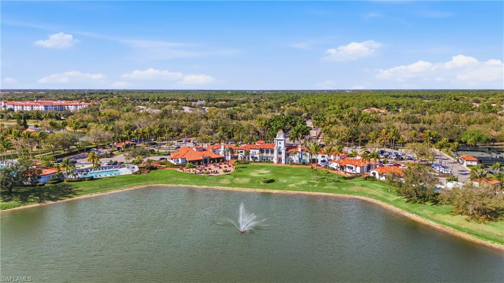 3614 El Segundo Court Naples, FL 34109 - Photo 46 of 49 a view of a lake with a houses