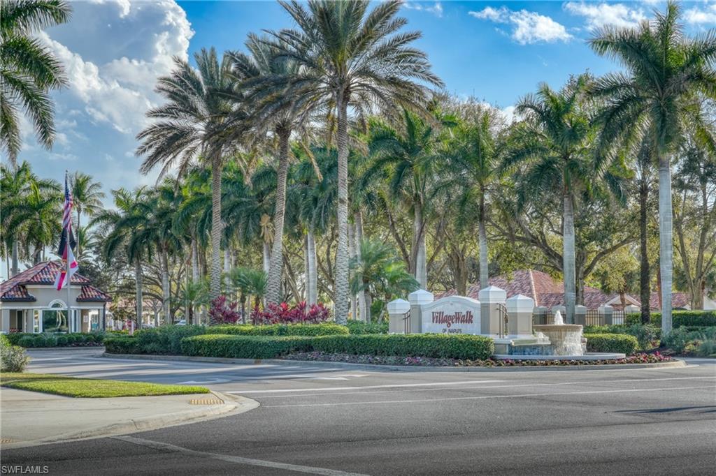 3614 El Segundo Court Naples, FL 34109 - Photo 49 of 49 a view of a swimming pool with palm trees