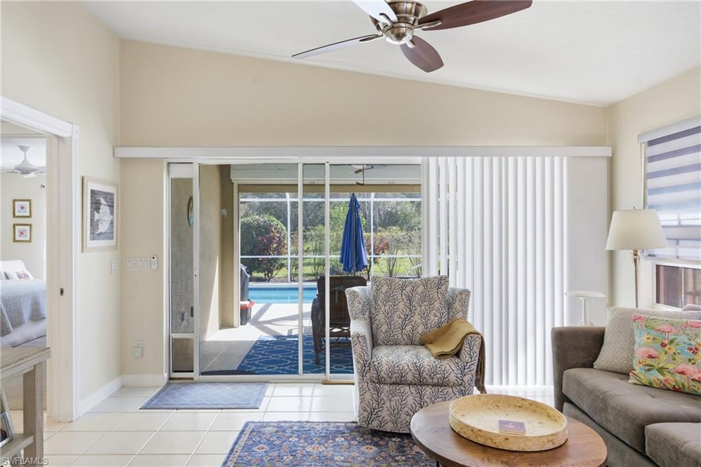 3614 El Segundo Court Naples, FL 34109 - Photo 6 of 49 a living room with furniture and a large window
