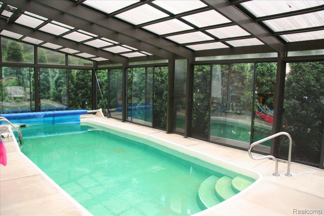 964 Middle Road Highland, MI 48357 - Photo 19 of 25 18 Indoor Pool with Heated Floor
