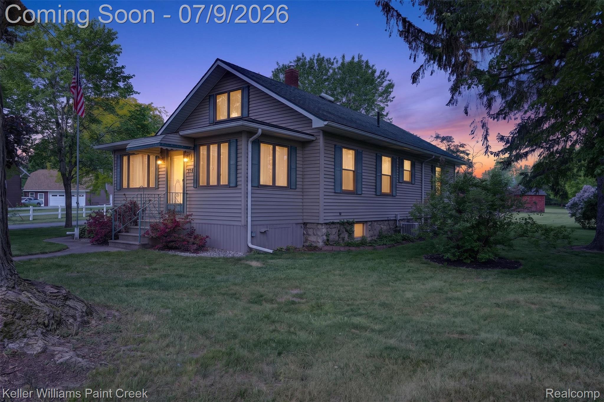 204 Russell Road Kawkawlin, MI 48631 - Photo 73 of 82 Single-story residence featuring horizontal siding, a gabled roof, and multiple windows with exterior shutters