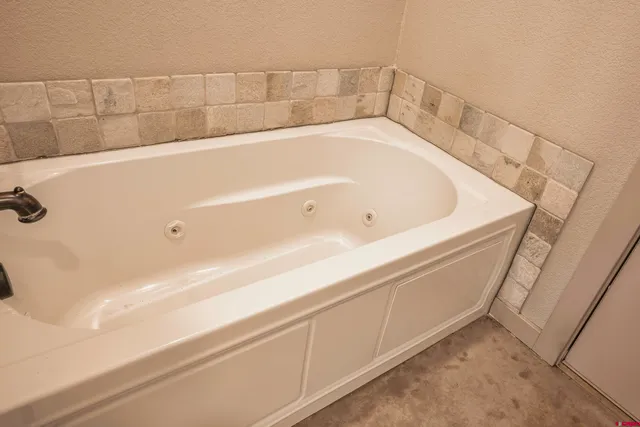 a bathroom with a bathtub