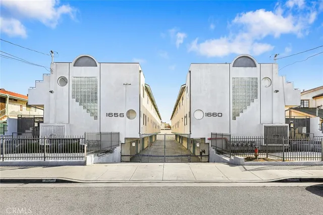 a view of a building with a view of front door