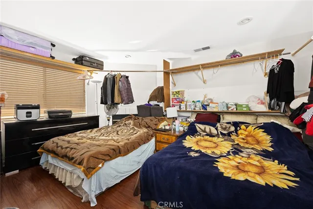 a bathroom with a sink mirror vanity and toilet