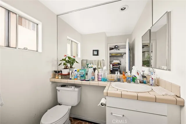 a view of staircase with white walls and a window