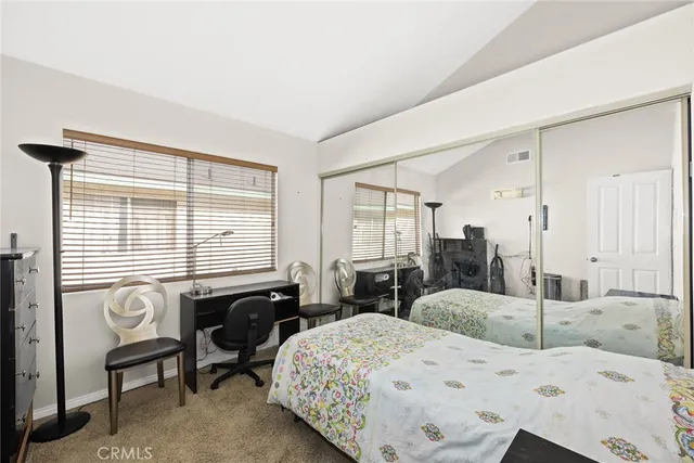 a white bath tub sitting next to a white toilet and sink