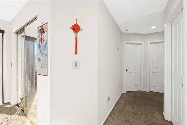 a view of a chairs and table in the balcony