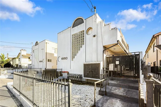 a view of a balcony with chairs