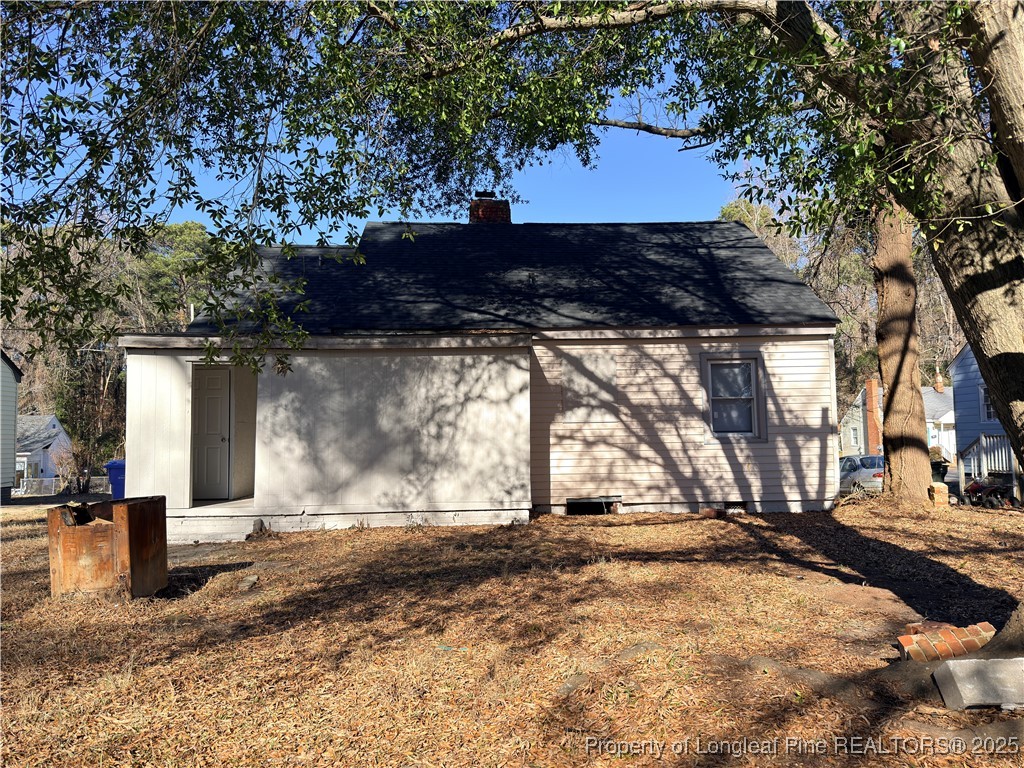 307 Hawthorne Road Fayetteville, NC 28301 - Photo 11 of 11 a view of backyard with large trees