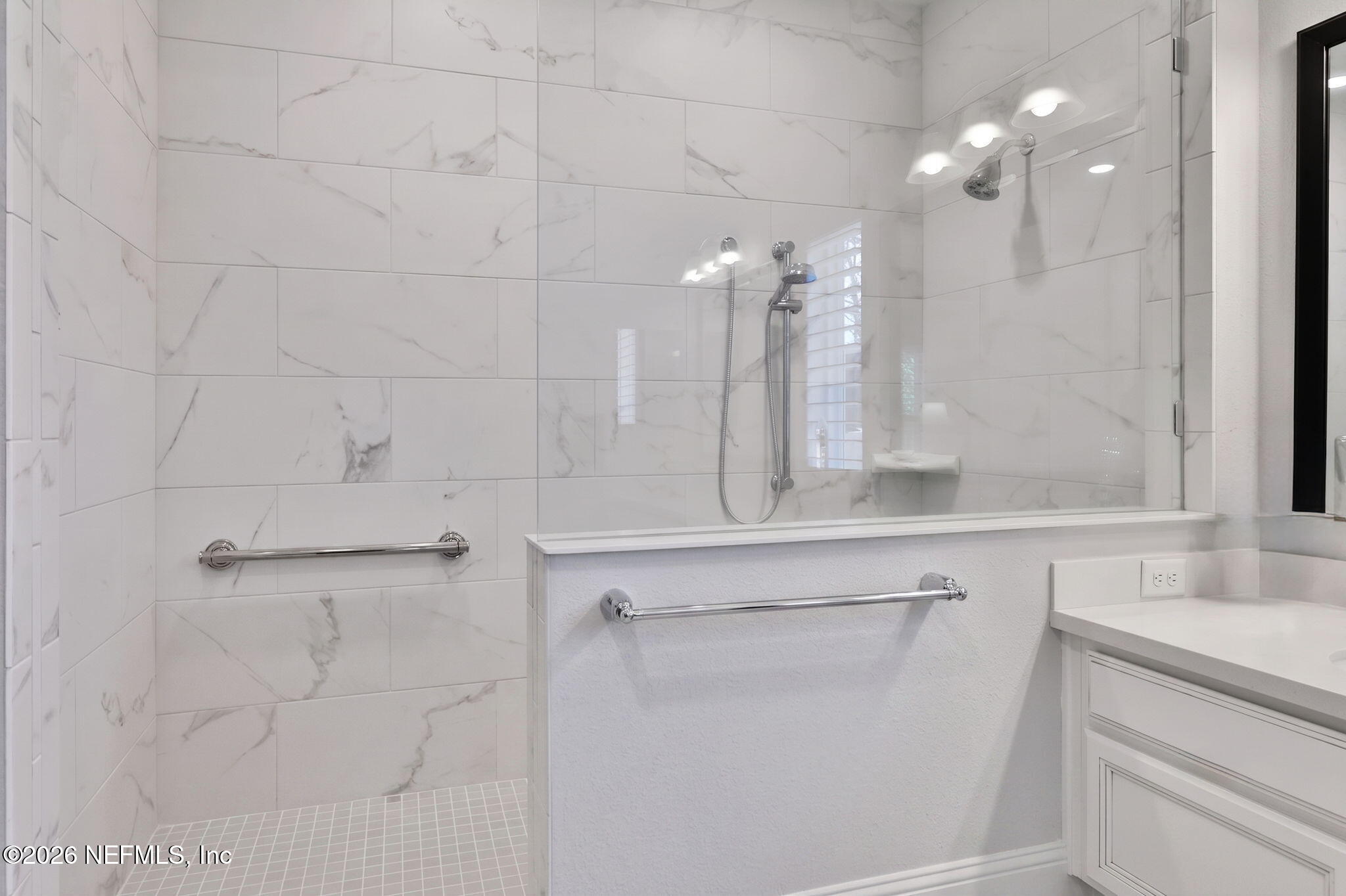 146 Clarendon Road St. Johns, FL 32259 - Photo 29 of 59 a bathroom with a sink and a mirror
