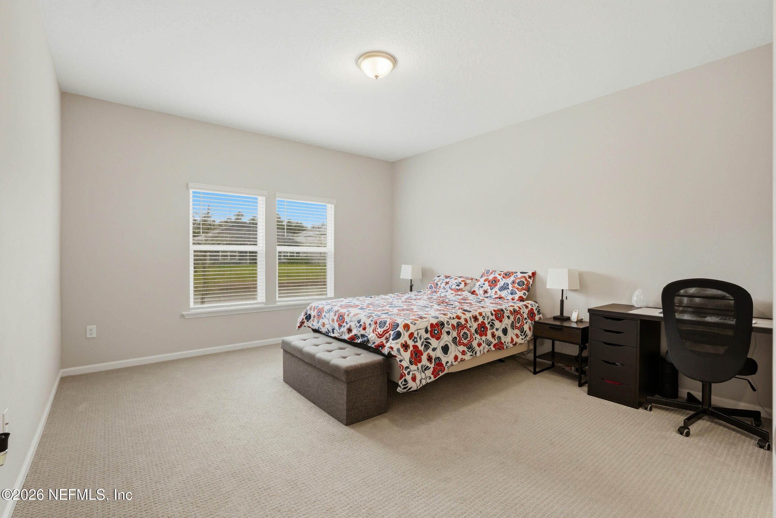 635 Sycamore Way Orange Park, FL 32073 - Photo 15 of 42 a bedroom with bed and a window