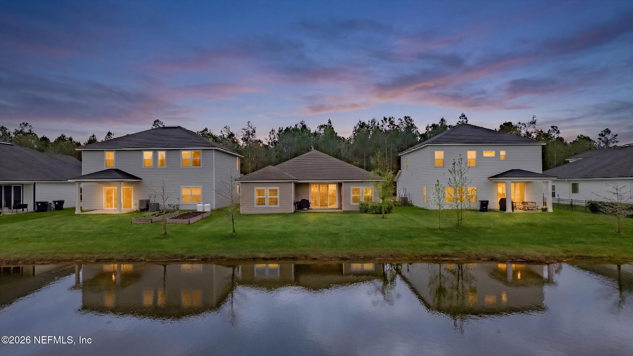 635 Sycamore Way Orange Park, FL 32073 - Photo 32 of 42 Backyard Twilight