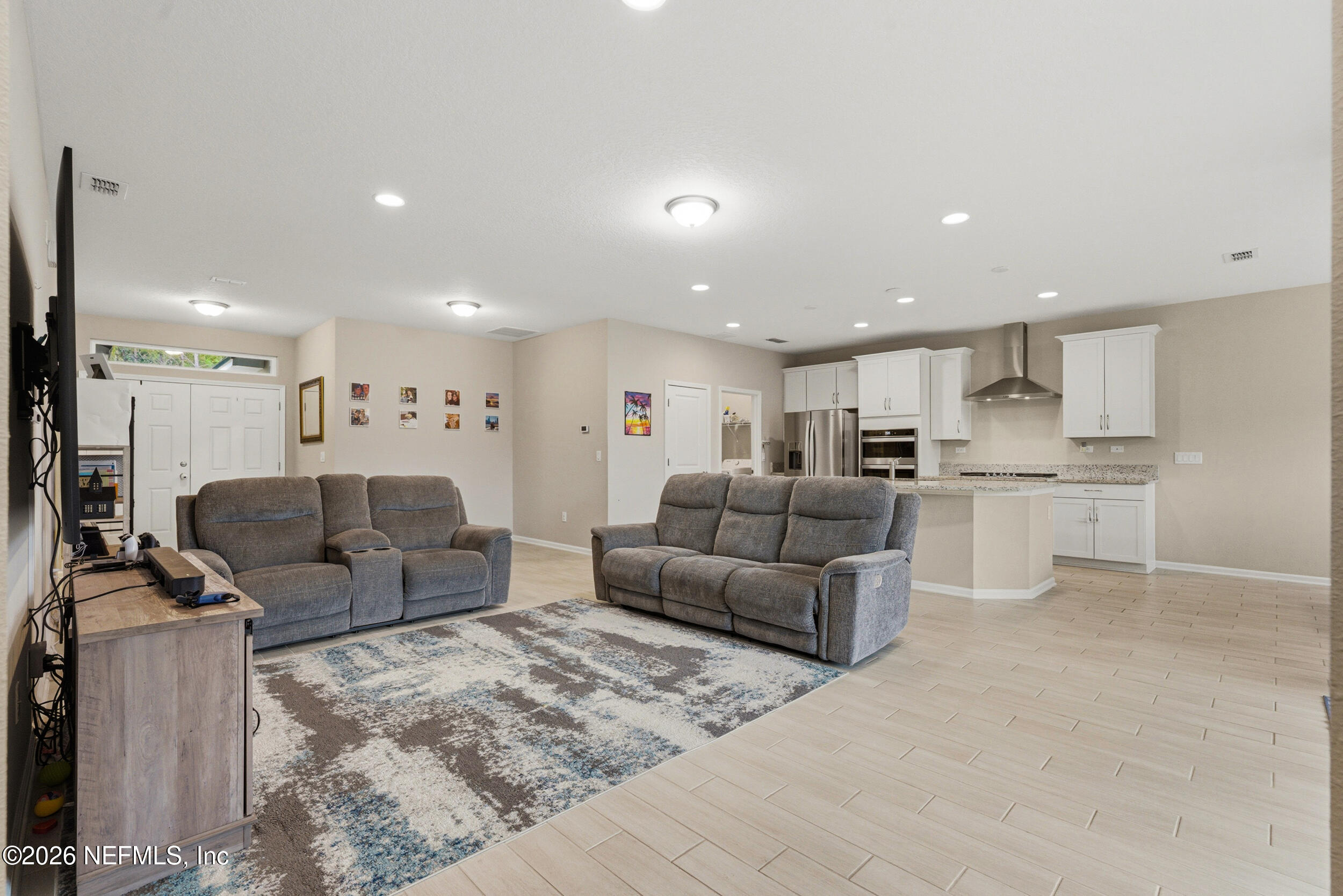 635 Sycamore Way Orange Park, FL 32073 - Photo 4 of 42 Family room to kitchen