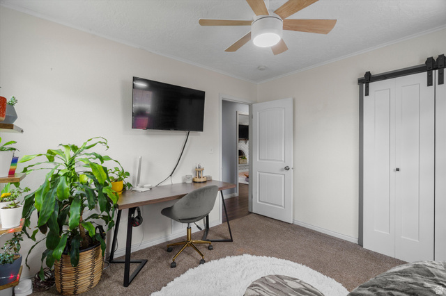 961 33rd Street Ogden, UT 84403 - Photo 18 of 39 Neutral wall tones complement the wood-finish ceiling fan with integrated lighting