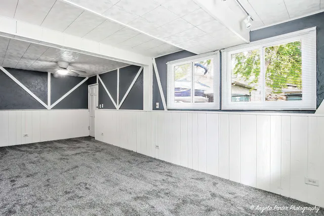 an empty room with windows