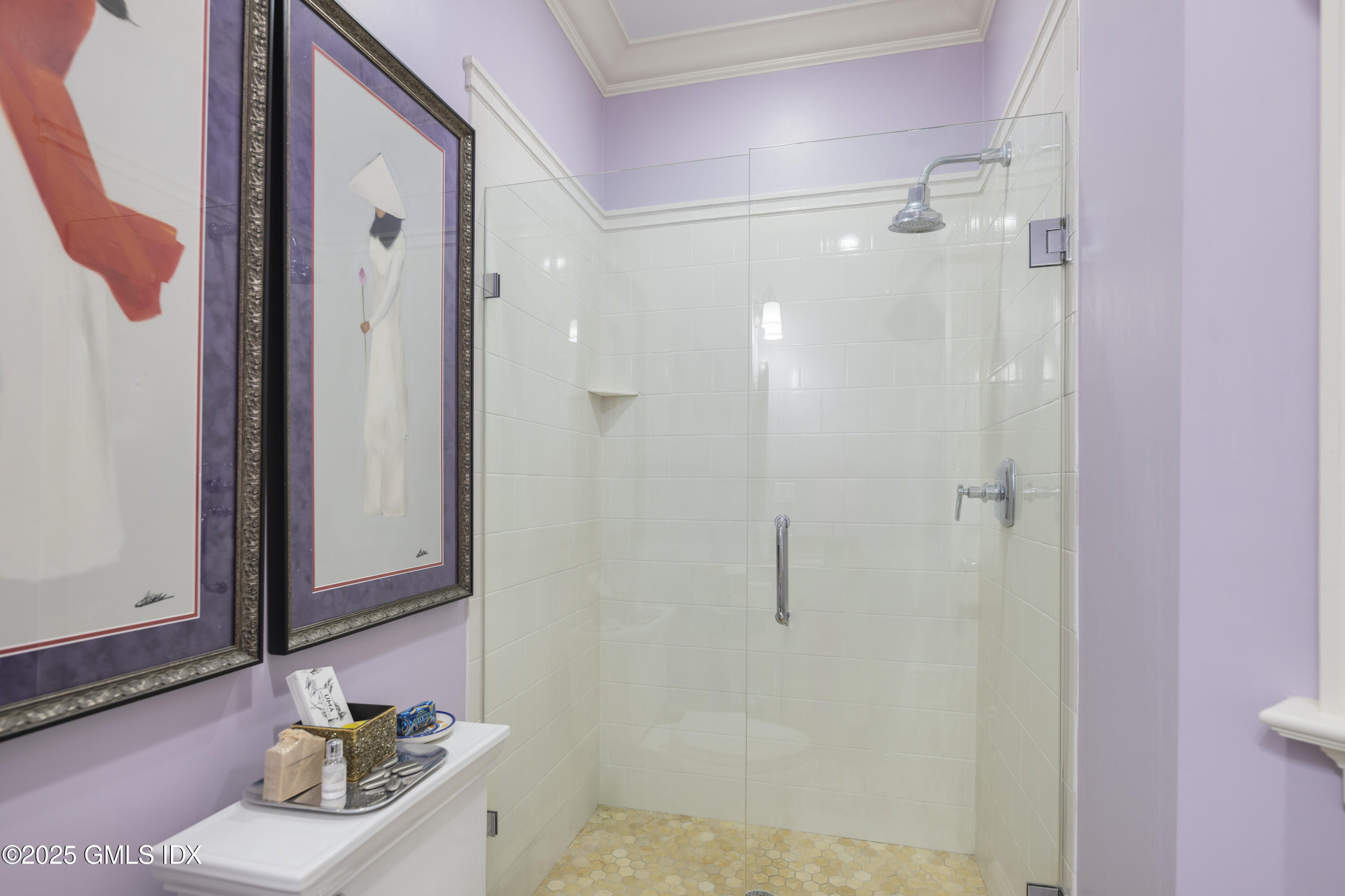 50 Sound View Drive, Unit 2N Greenwich, CT 06830 - Photo 19 of 37 a bathroom with a sink and a mirror